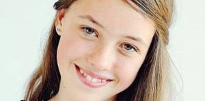 Teen girl receiving eye exam at optometry clinic